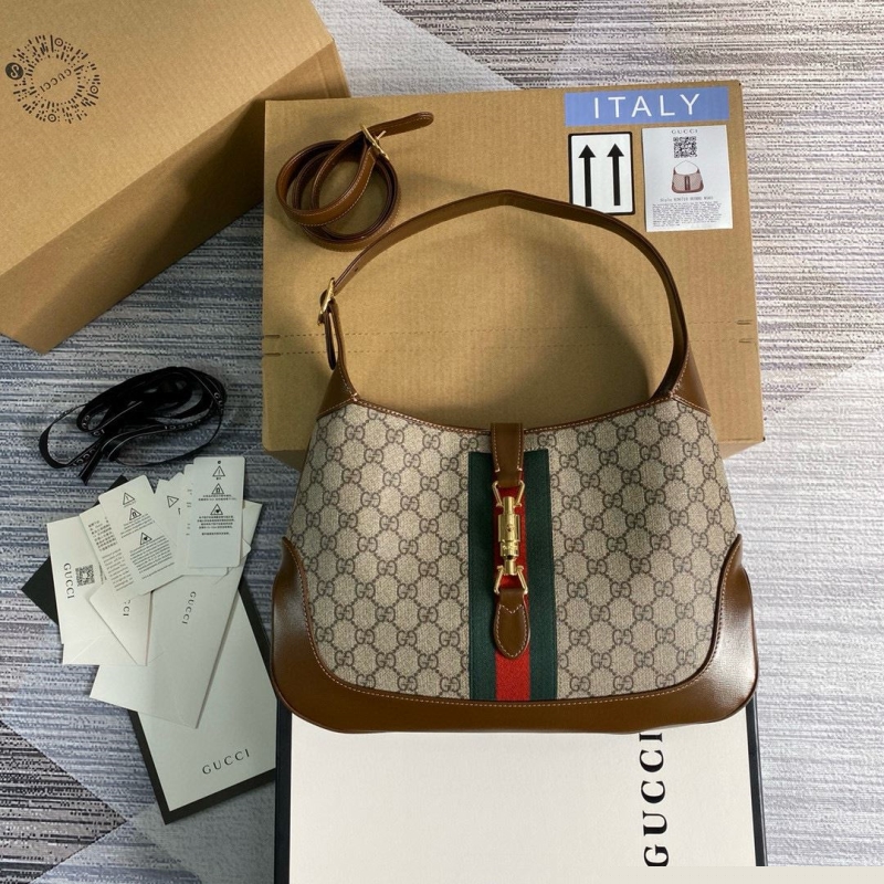G*u*i top handle bags